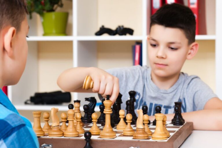 Boy playing chess. Licensed from Shutterstock.