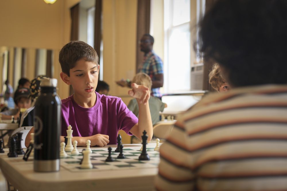 Child playing chess