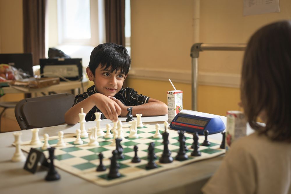 Child playing chess