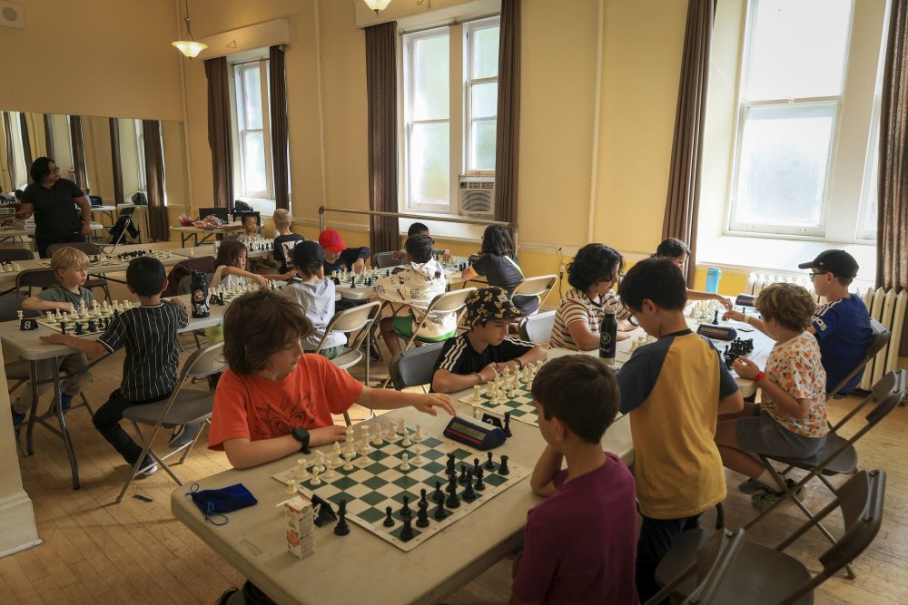 Students playing chess at PA Day camp