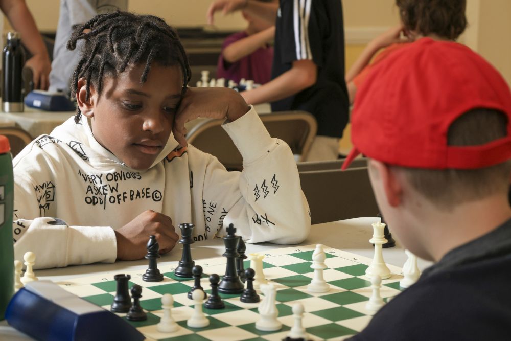 Child playing chess