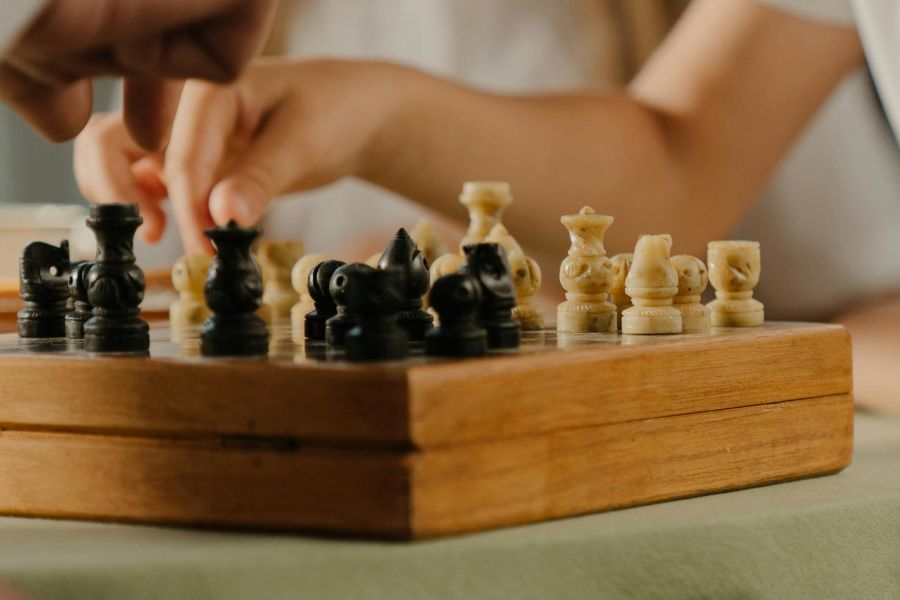 Child playing chess. Photo by cottonbro studiios, Pexels.com.